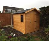 Apex shed with opening window and Kerabit felt.