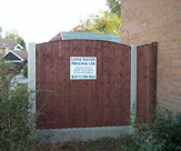 F07 - Concrete Slotted Posts, Smooth Gravel Boards and 6ft x 5ft Convexed Feather Edge Fence Panels