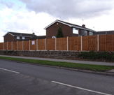 F09 -6ft high fencing with 6 x 1 smooth gravel boards and 6 x 5 feather edge fence panels
