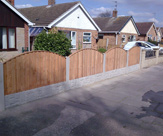 F16 - Convexed Feather Edged Fence Panels with Rock Faced Gravel Boards