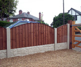 F24 - Convexed Feather Edged Fence Panels with Rock Faced Gravel Boards