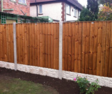 F40 - Concrete slotted posts, Rock faced gravel boards & Pressure treated feather edge fence panels