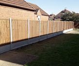 2 metre high fencing with 2 gravel gravel boards.