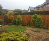 6 x 6 pressure treated premium feather edged fence panels with wooden posts and caps fitted in Toton.