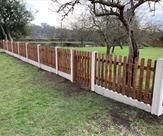A nice run of picket fencing with a mortice and tenon picket gate to match.