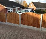 Arched Panels 6' x 3' with Patterned Gravel Boards and Concrete Posts