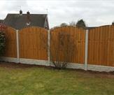 Convexed feather edge fence panels erected in Toton