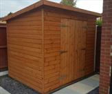 Pent loglap shed