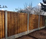 Premium feather edge fence panels with concrete posts and plinths 2017