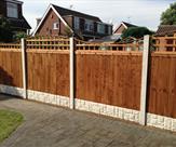 Wave Effect Trellis with Concrete Posts and Rock Faced Gravel Boards
