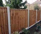 5ft 6inch fence with 6inch gravel boards.