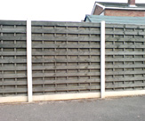 F05 - Concrete Slotted Posts, 6inch smooth gravel board and 6 x 6 Horizontal Hit and Miss Fence Panel