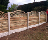 F51 - Continental Fencing with Concrete Posts and Rock Faced Gravel Boards