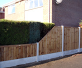 F57 - Premium feather edged fence panels including slope.