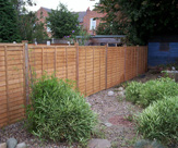 F21 - Waney Edge Fence Panels with 3 x 3 Wooden Posts